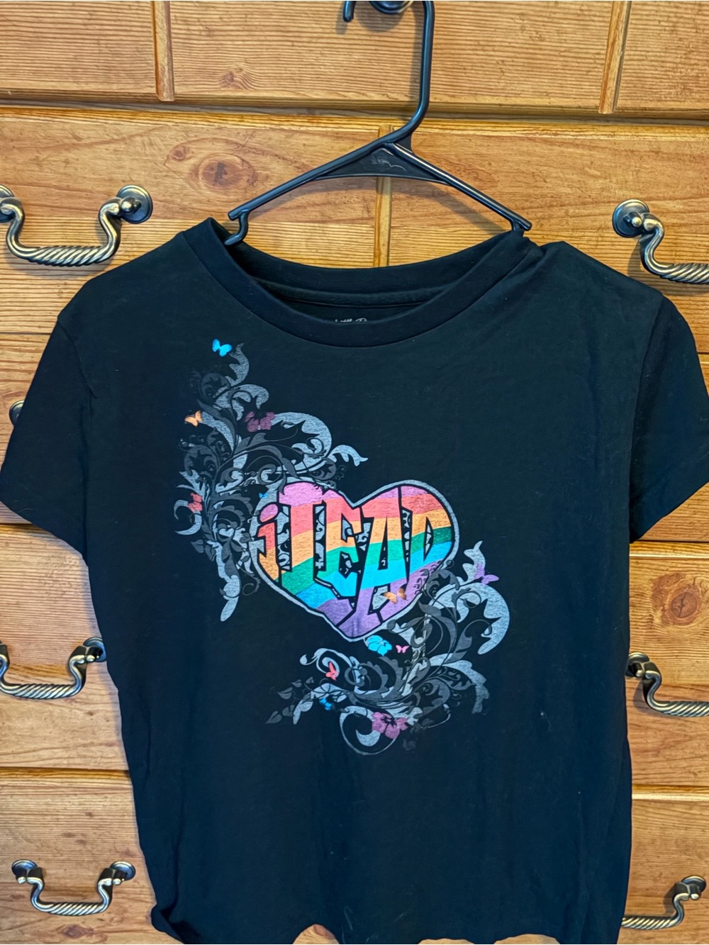 Juniors Black Graphic Tee with Rainbow Heart "I Lead"